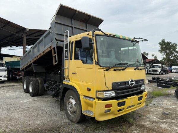 Side view of the Hino FR1K 19.5ft Steel Tipper, showcasing its robust steel body and built for heavy-duty transport.