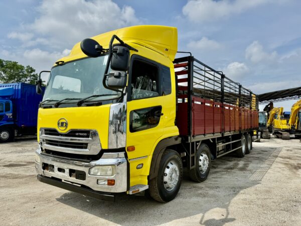 Rear view of the Nissan RJ UD truck showing the wooden cargo area, ideal for transporting large goods.